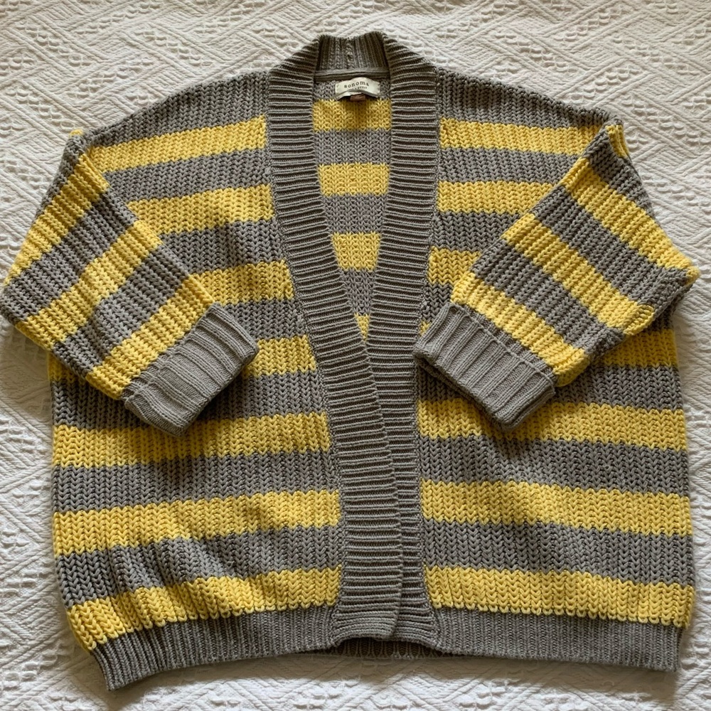Open cardigan with a varsity look.